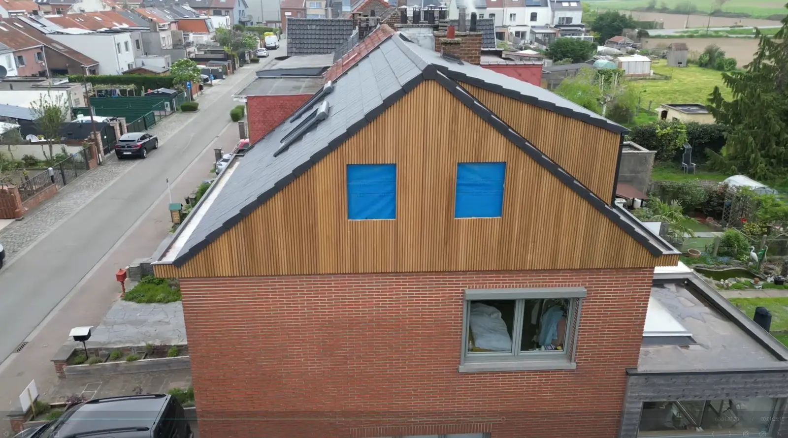 Volledige dakrenovatie met architecturale dakkapel, hoofdbeeld van het project in Beersel