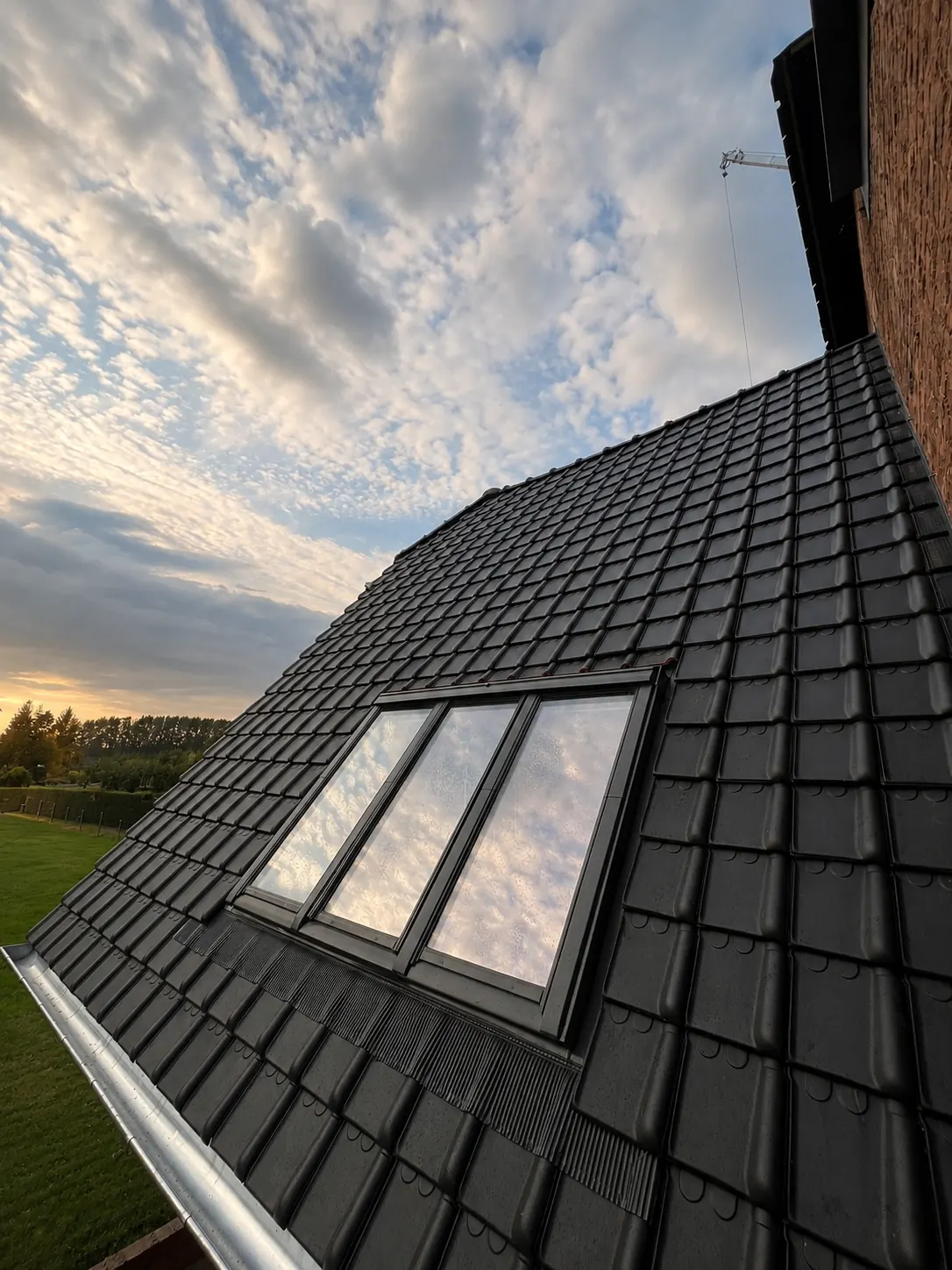 Sluitend perspectief van Totaalrenovatie met dakpannen, leien en zinkwerk